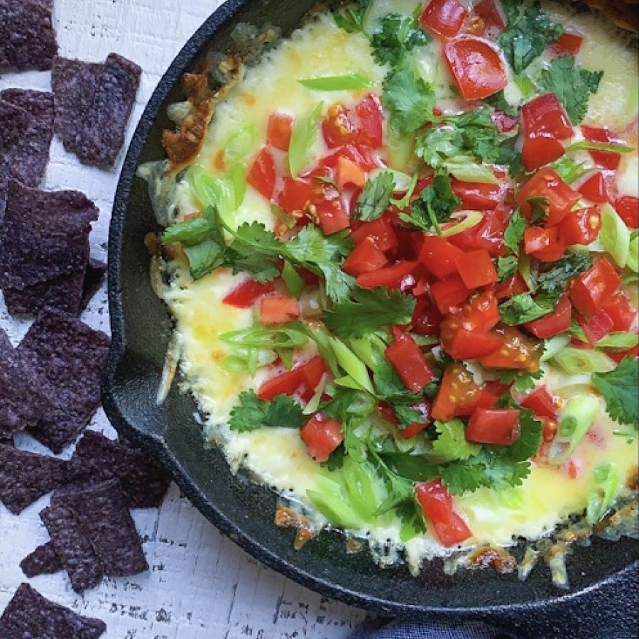 Skillet Queso Fundido with Fresh Tomatoes and Cilantro