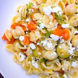 Orecchiette with Zucchini Blossoms, Baby Tomatoes and Feta