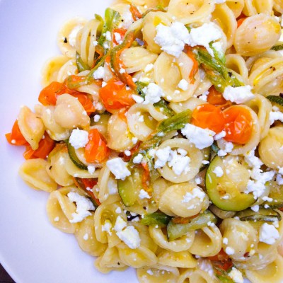 Orecchiette with Zucchini Blossoms, Baby Tomatoes and Feta